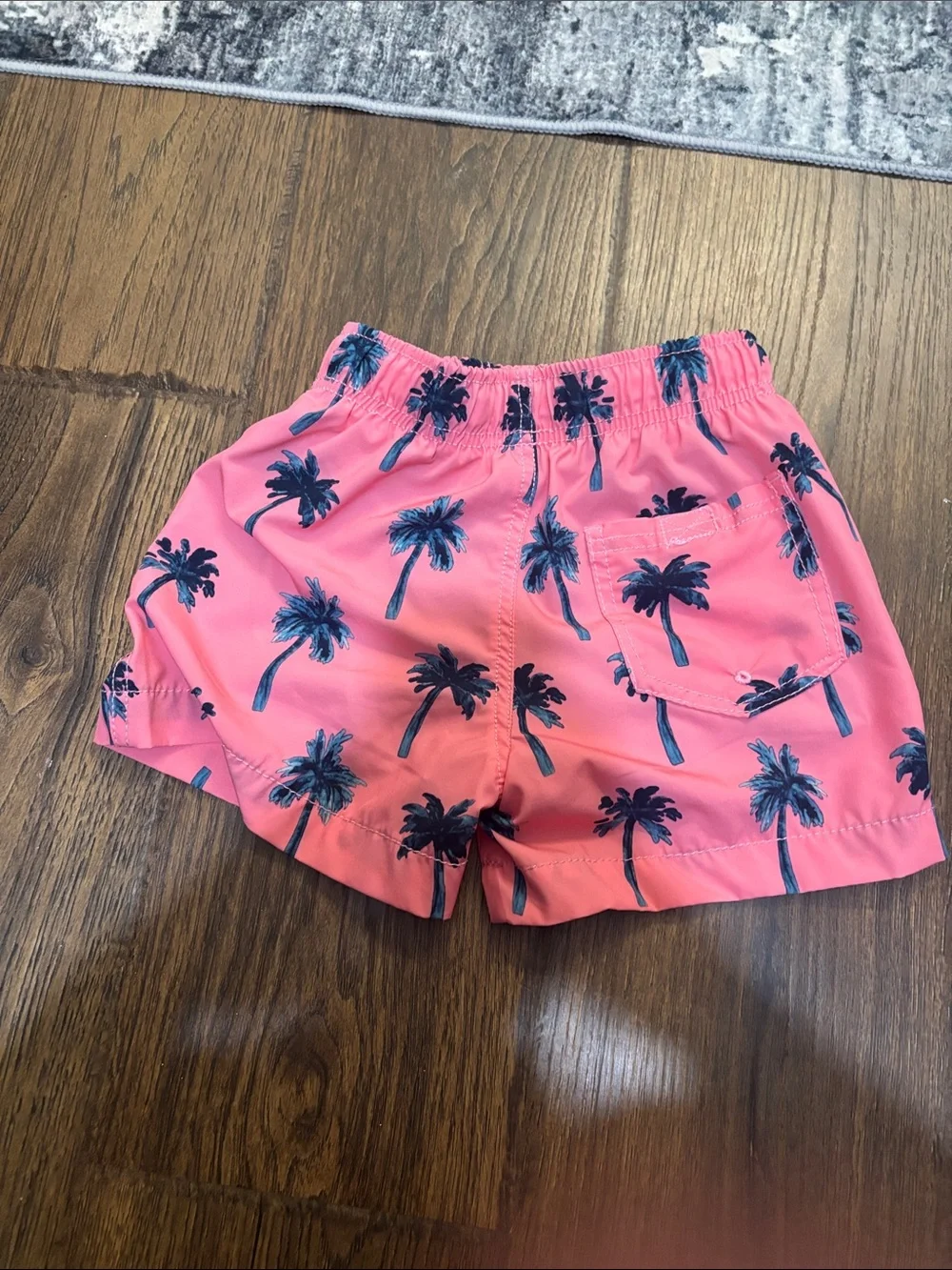 Kids' Pink Palm Print Swim Trunks